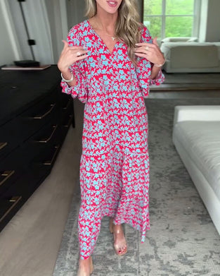 Blomstret lang kjole med V-hals med lanterneermer