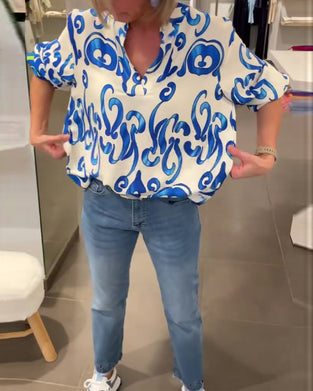 Elegant langermet topp med trykt V-hals