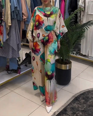 Lotus print sett med en skulder og trekvart erme