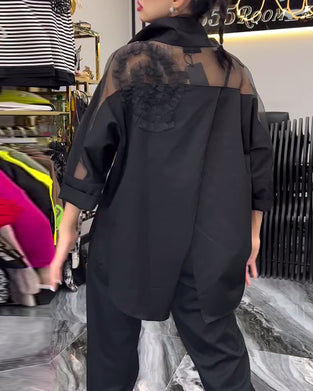 Lapel-blonde med lappeteppe blomsterbluse