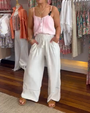 Ensfarget komfortabel bukse med brede ben med lommer