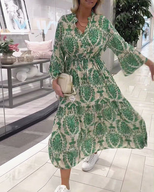 Kjole med snøring med klokkeermer