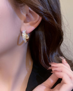 Glitrende små ringøredobber