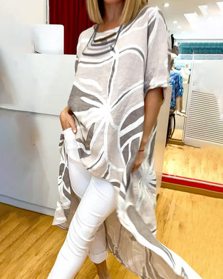 Topp med løs, uregelmessig passform