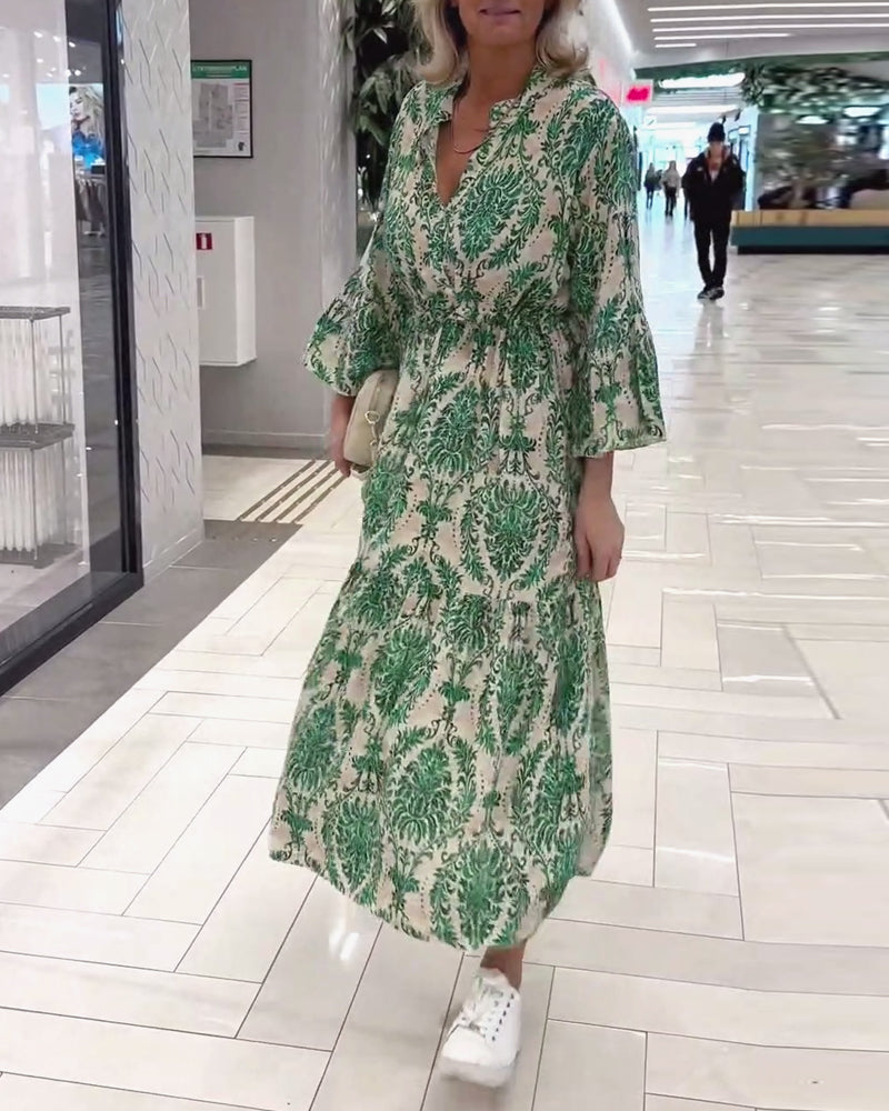 Kjole med snøring med klokkeermer