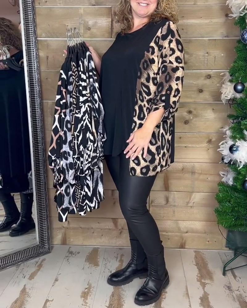 Avslappet topp med rund hals i leopard