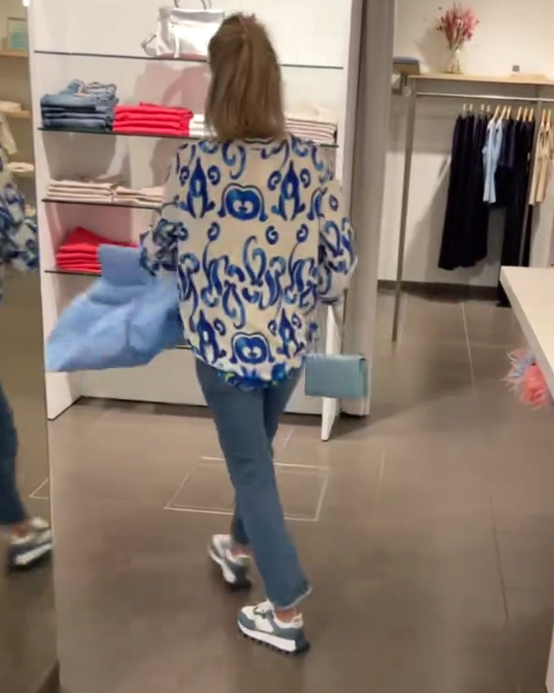 Elegant langermet topp med trykt V-hals