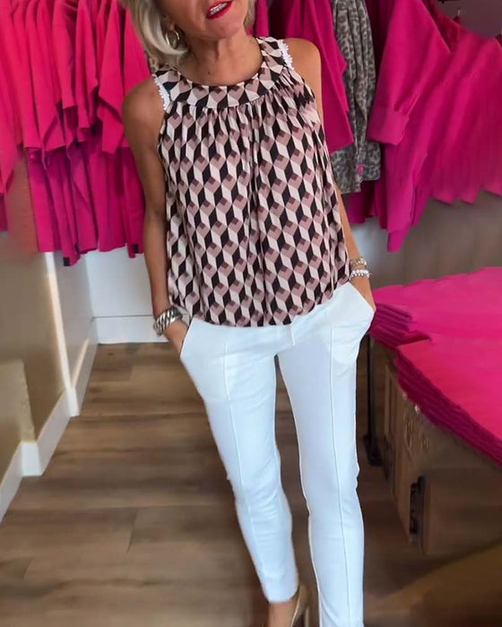 Ermeløs topp med rund hals med diamanttrykk