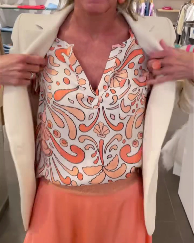 Avslappet bluse med V-hals og raglanermer