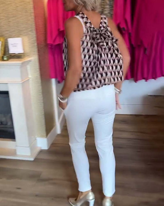 Ermeløs topp med rund hals med diamanttrykk