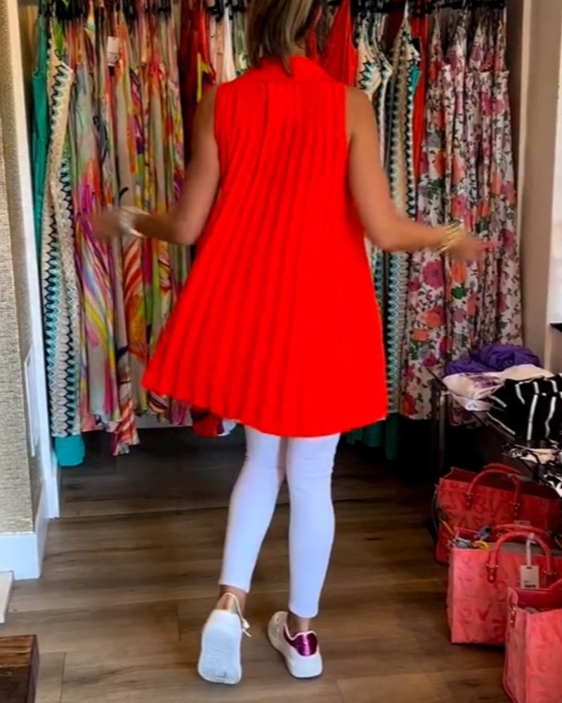 Ermeløs topp med volanger og jakkeslag