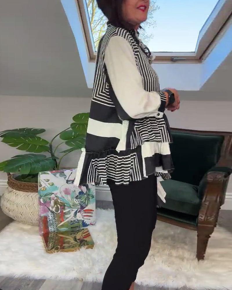 Uregelmessig patchworkskjorte med motetrykt knapp