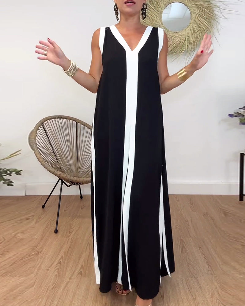Fasjonabel ermeløs kjole med V-hals i kontrasttrykk