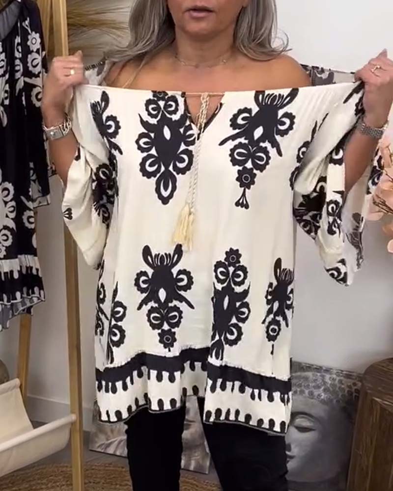 Bluse med off-the-shoulder og løs sitt