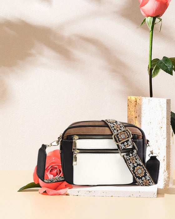 Multifunksjonell crossbody-veske med glidelås