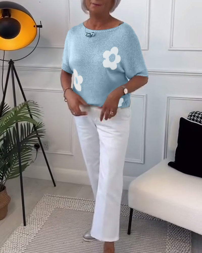 Slank blomstergenser med rund hals