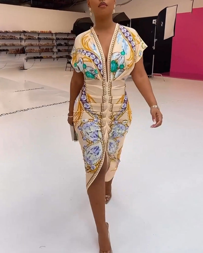 Kjole med dyp V spalt i midjen