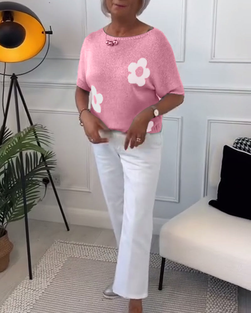 Slank blomstergenser med rund hals