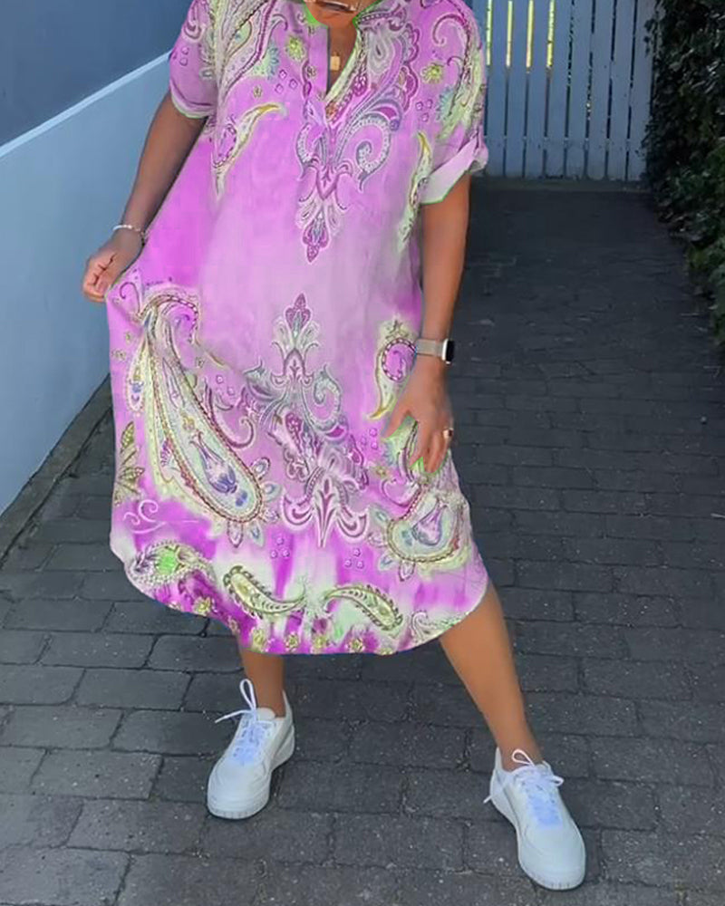 V-hals fold-erme trykt kjole