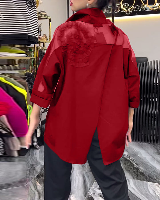 Lapel-blonde med lappeteppe blomsterbluse