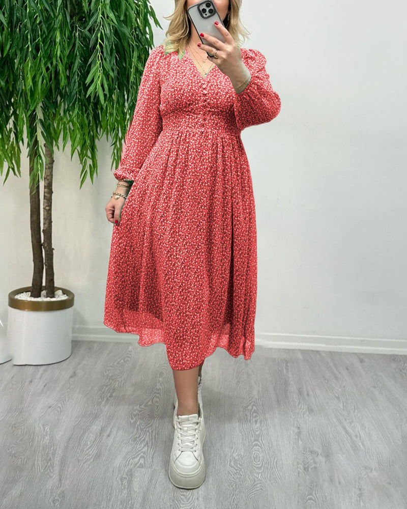 Elegant kjole med trykk med knapper