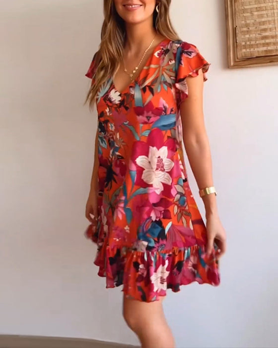 Blomsterkjole med V-hals og ruffles