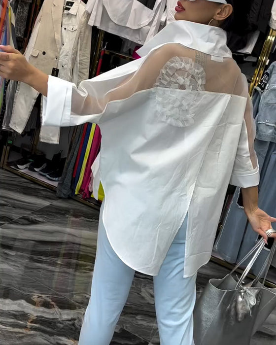 Lapel-blonde med lappeteppe blomsterbluse