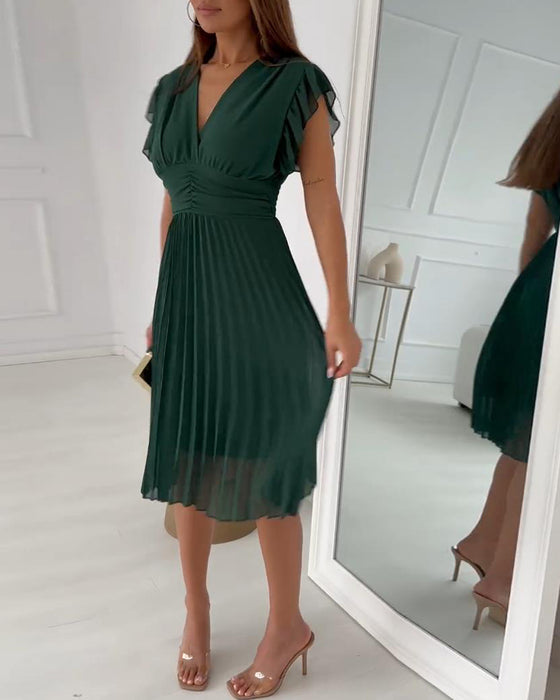 Elegant plisseret kjole med volangermer for kvinner