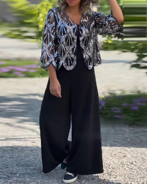 Elegant kåpe med paljetter og bølgekant