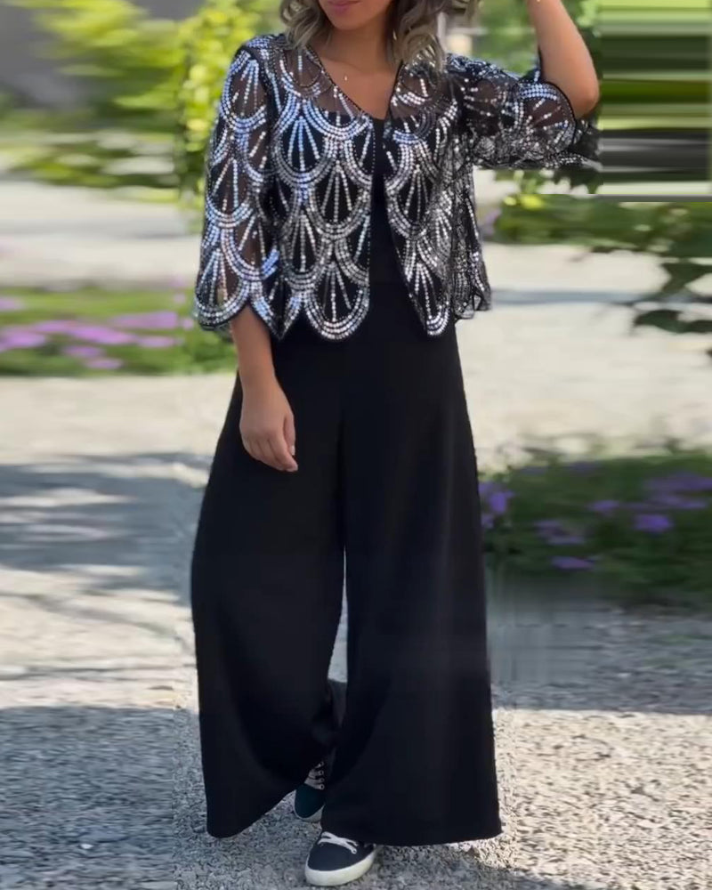 Elegant kåpe med paljetter og bølgekant