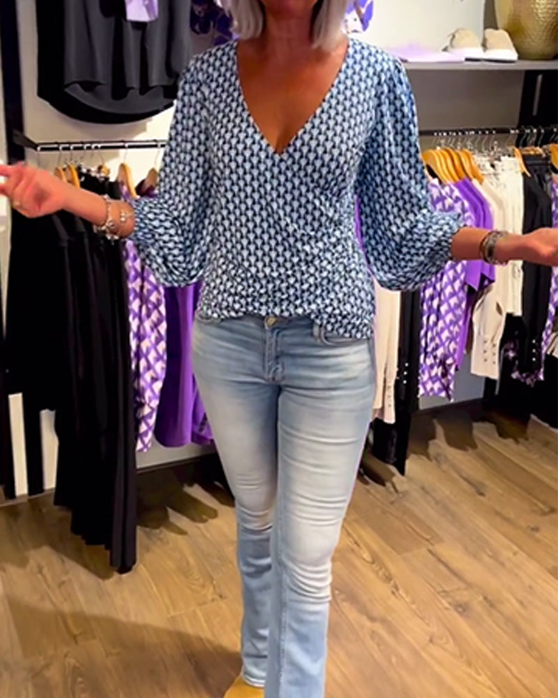 Lang ermet topp med dyp V-hals