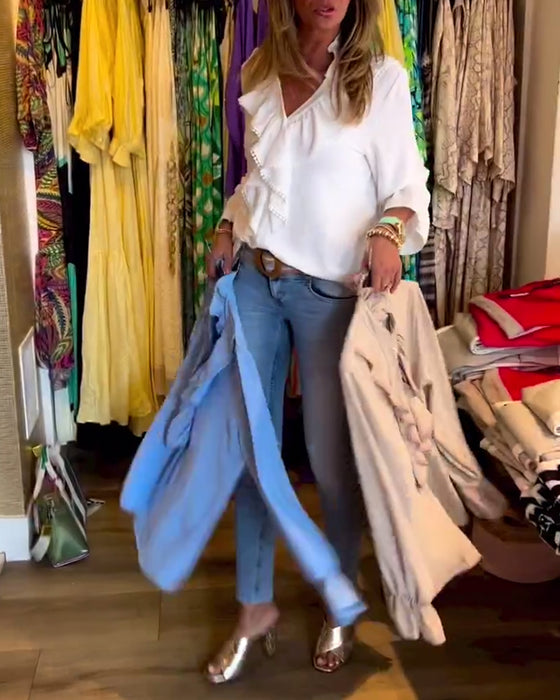 Designerbluser med volang for kvinner