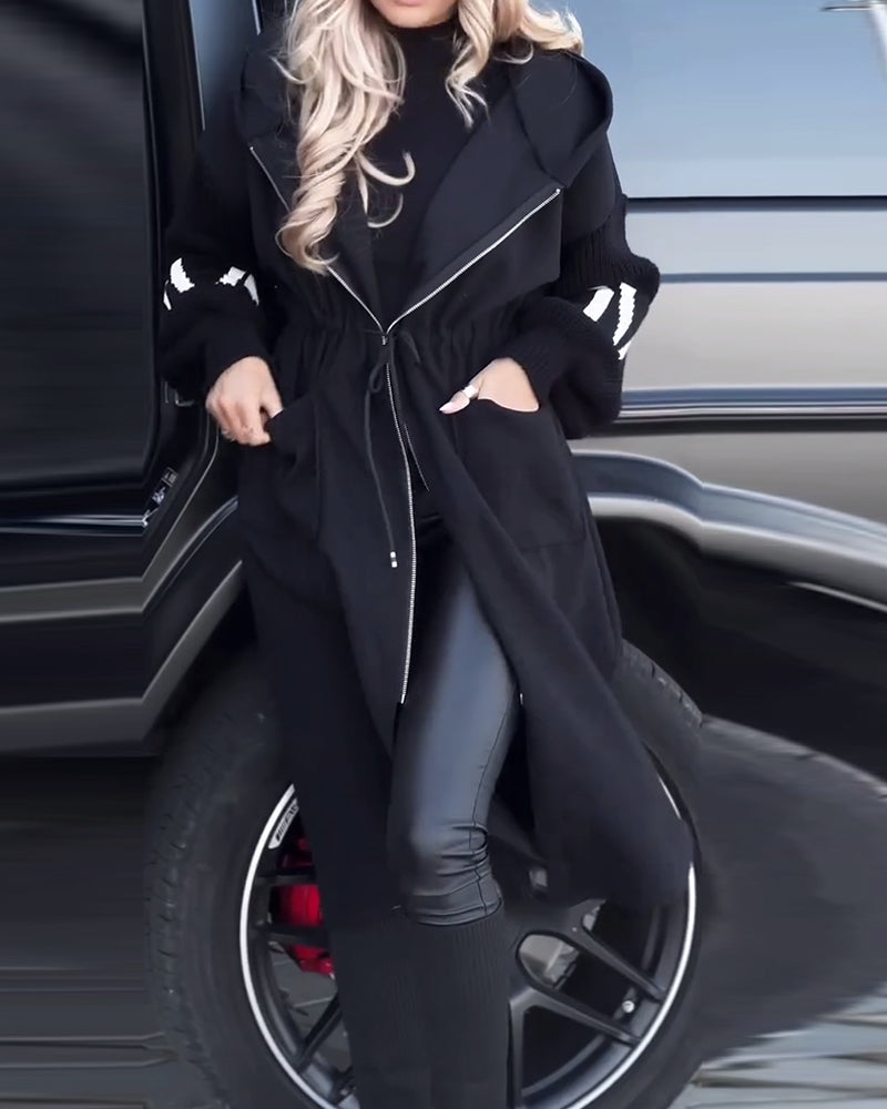 Løs lang kåpe med uformelle lommer