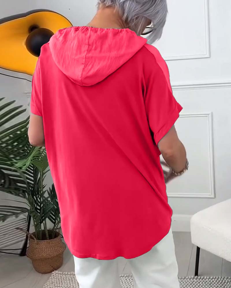 Uformell hettebluse med korte ermer med blomstertrykk