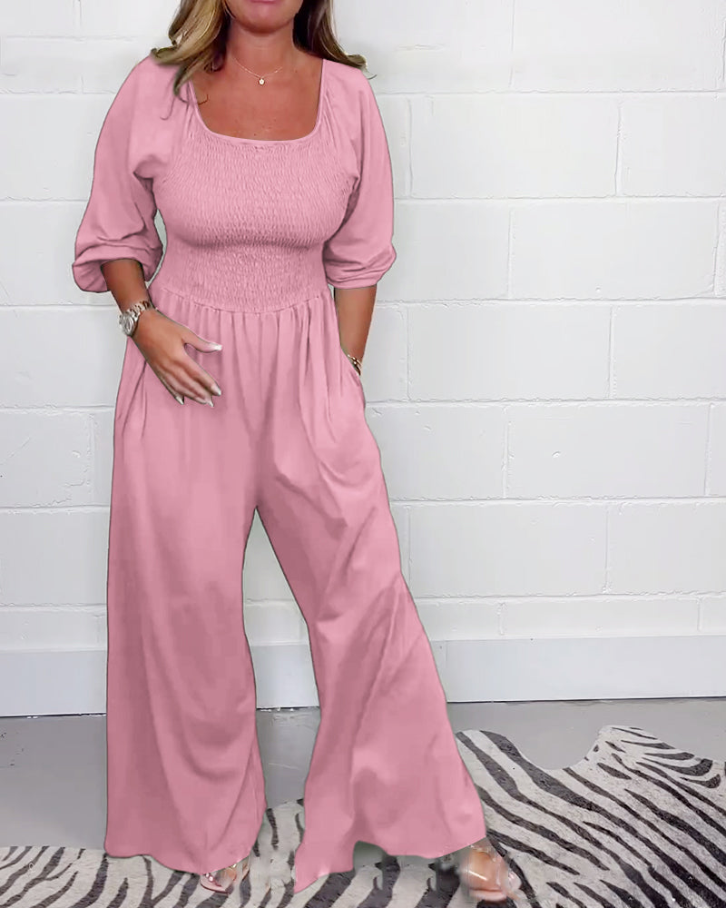 Ensfarget jumpsuit med firkantet hals