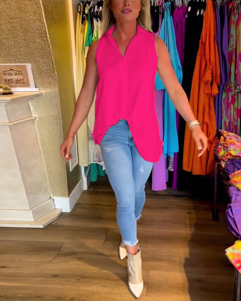 Ermeløs topp med volanger og jakkeslag