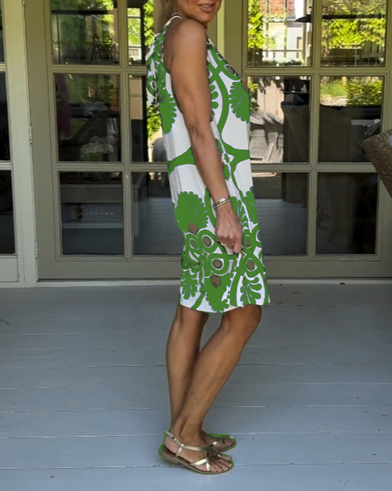 Kjole med halterhals i vintageprint