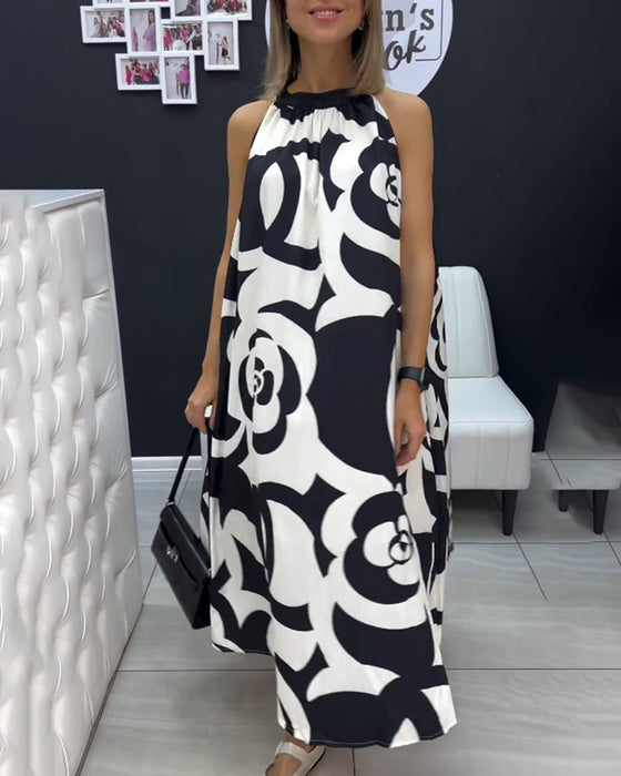 Ermeløs elegant printet kjole