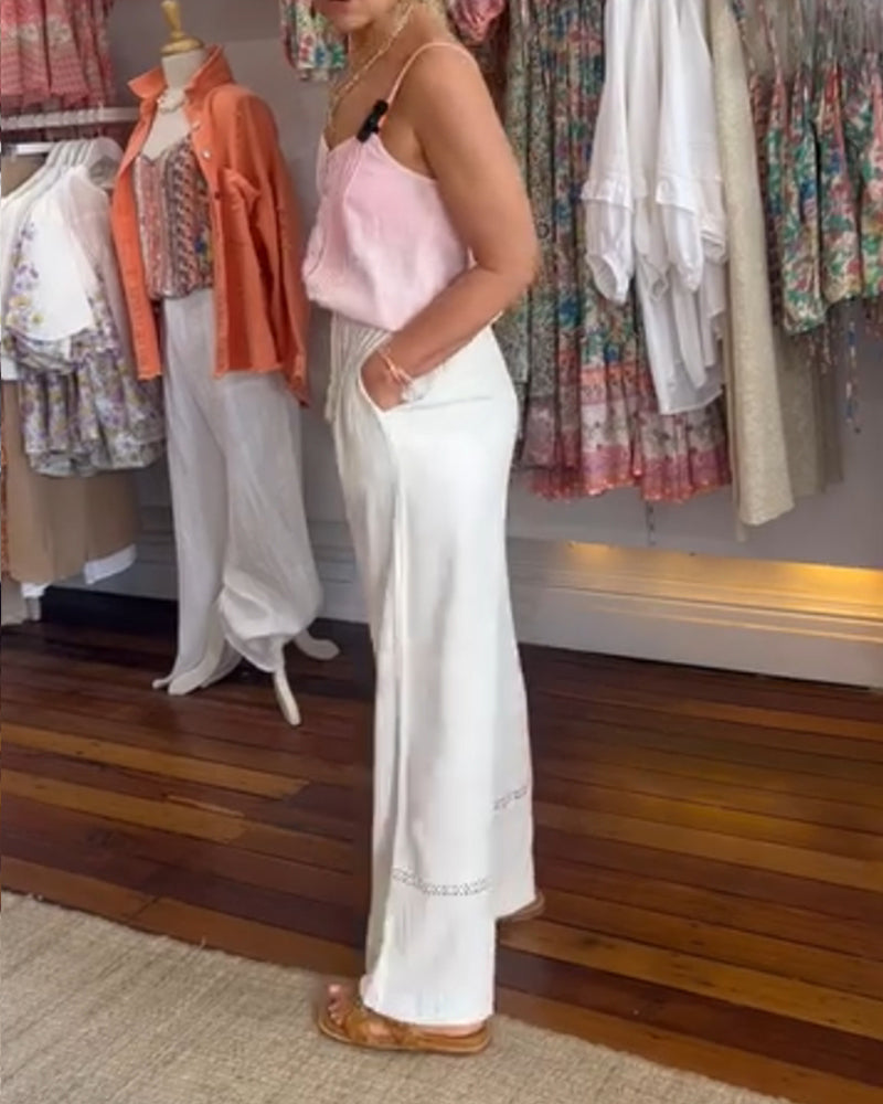 Ensfarget komfortabel bukse med brede ben med lommer