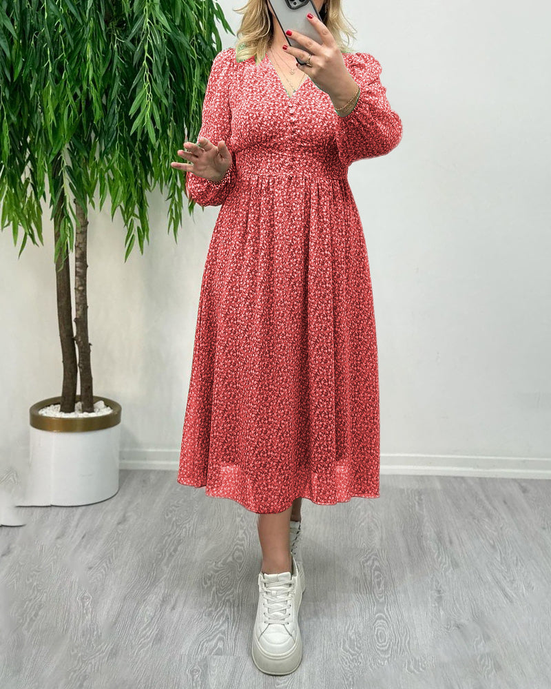 Elegant kjole med trykk med knapper