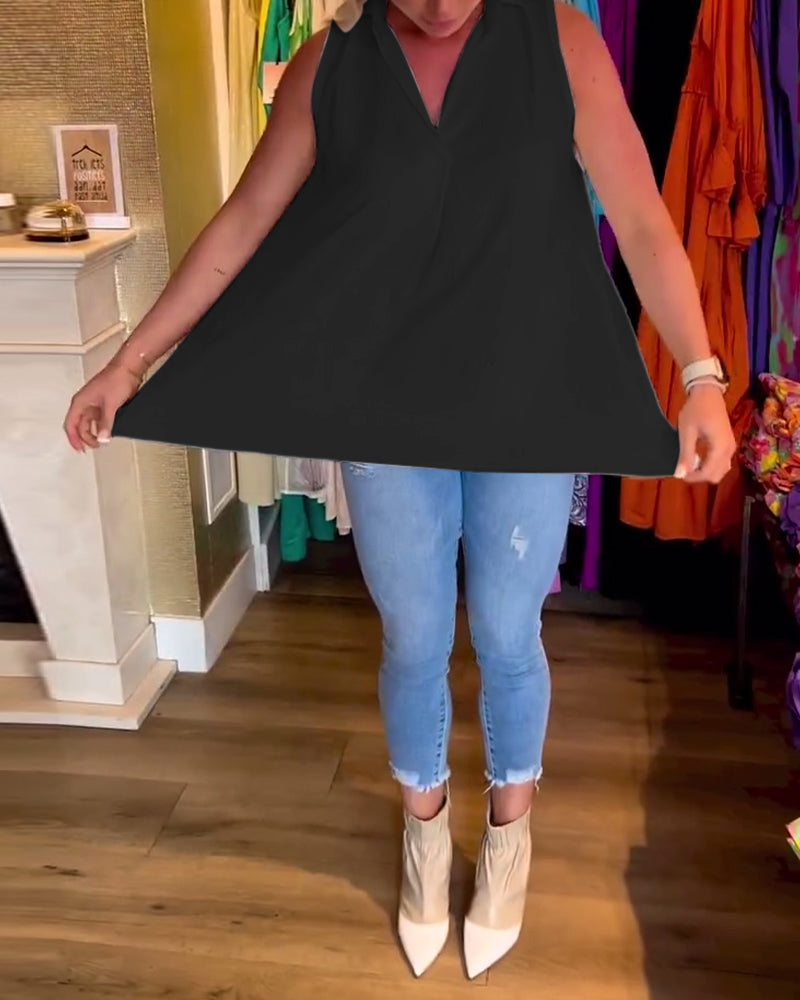 Ermeløs topp med volanger og jakkeslag