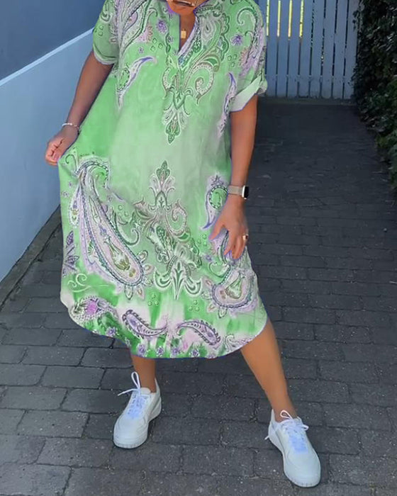 V-hals fold-erme trykt kjole