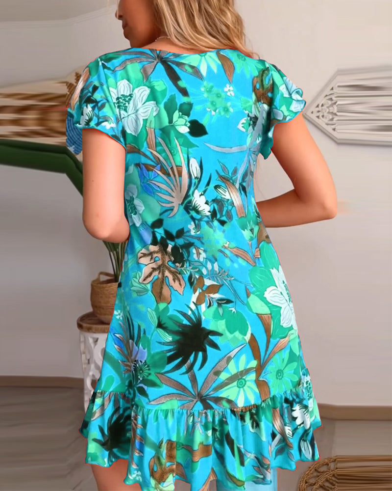 Blomsterkjole med V-hals og ruffles