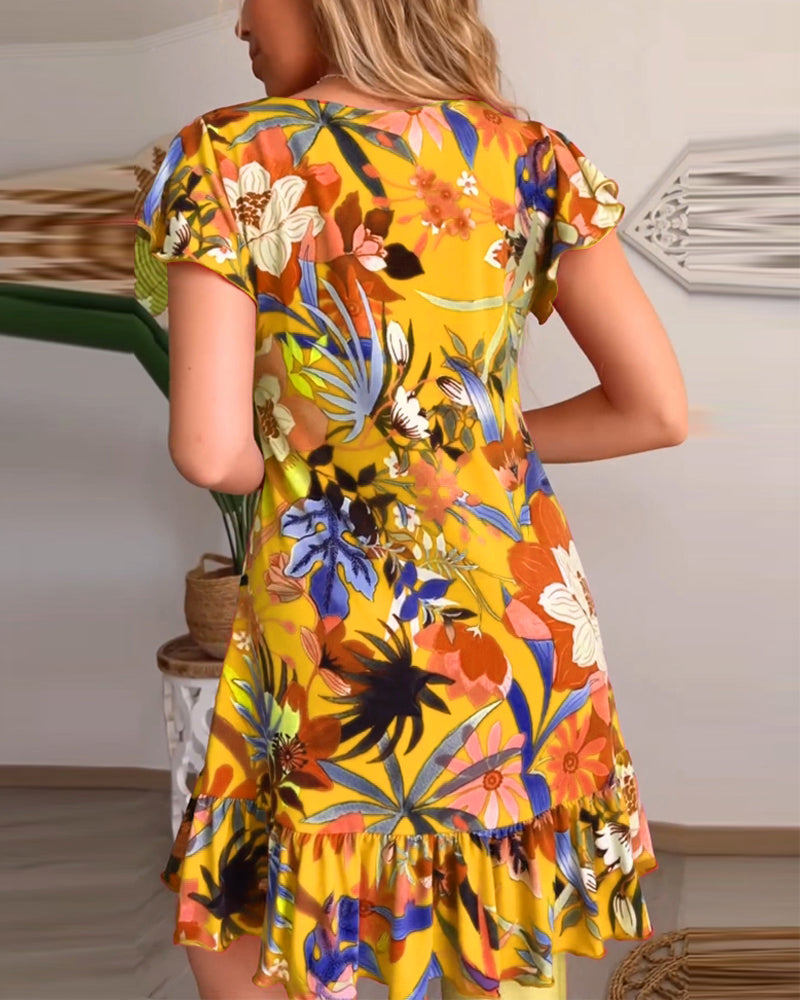 Blomsterkjole med V-hals og ruffles