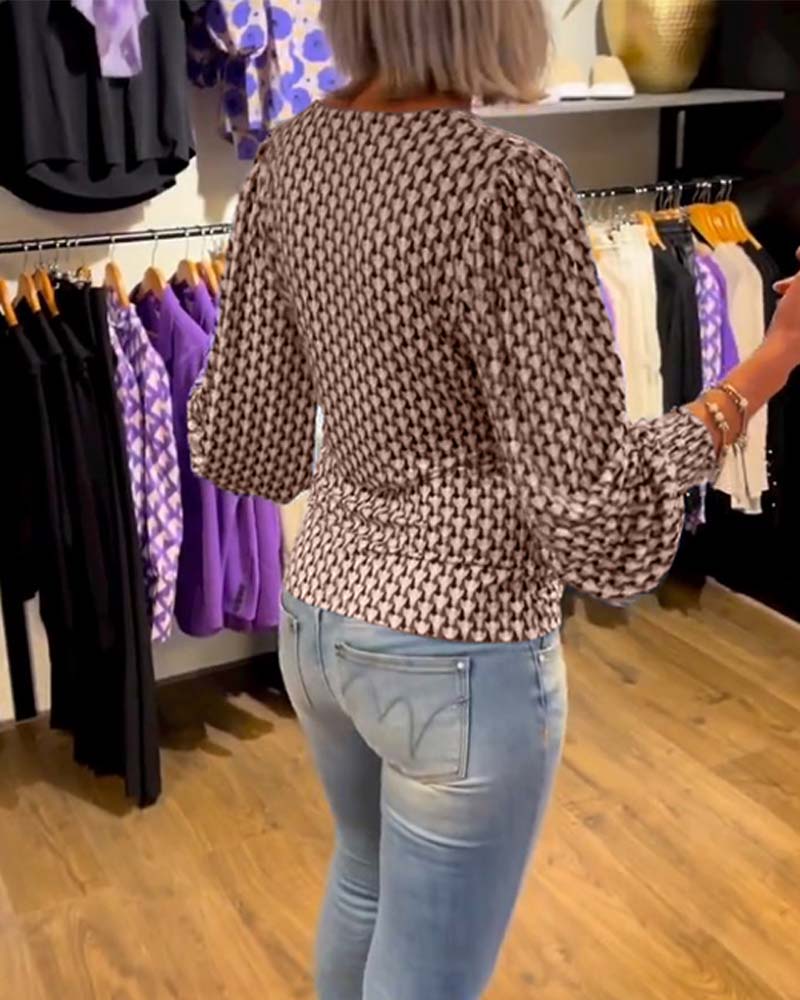 Lang ermet topp med dyp V-hals