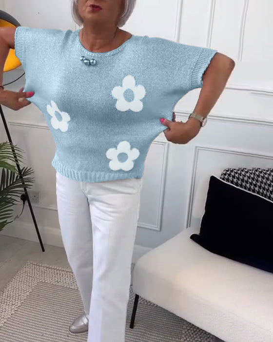 Slank blomstergenser med rund hals