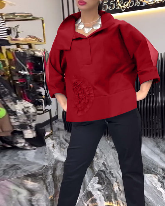 Lapel-blonde med lappeteppe blomsterbluse