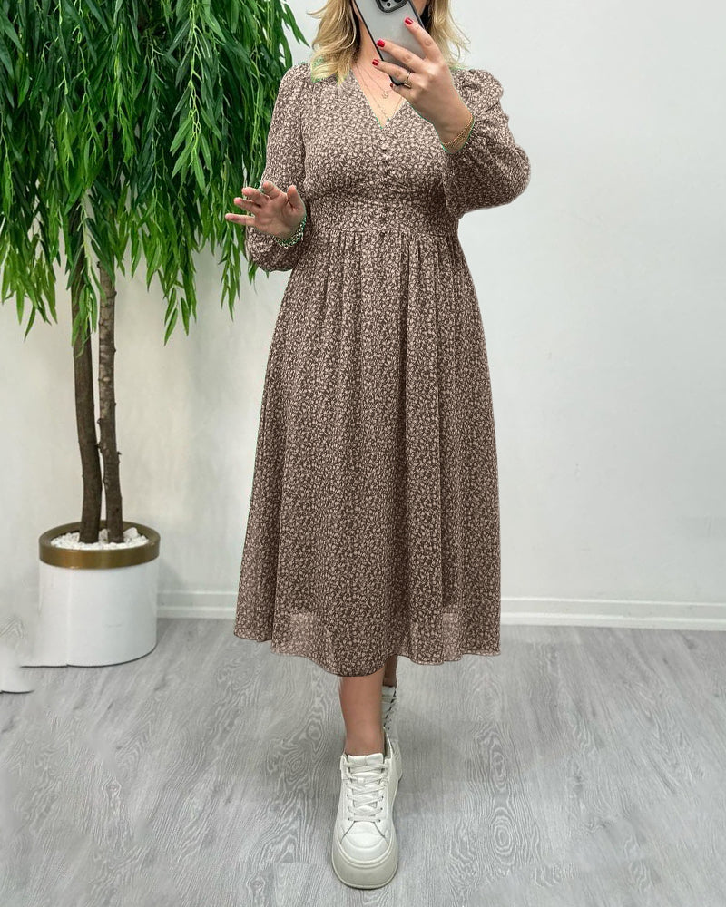 Elegant kjole med trykk med knapper