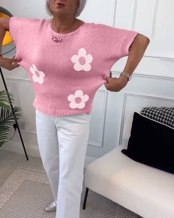 Slank blomstergenser med rund hals