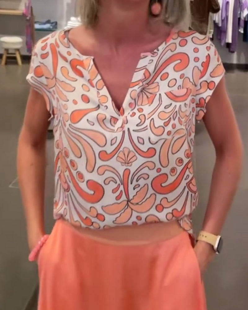 Avslappet bluse med V-hals og raglanermer